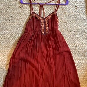 Rust Red Sleeveless Dress with Floral Trim